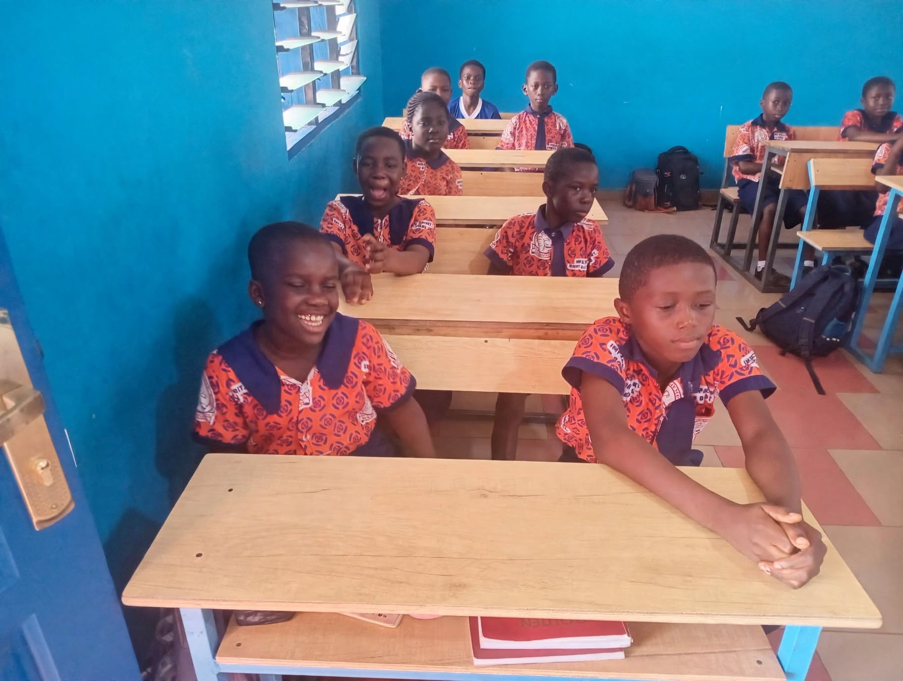 Trinity pupils gather together in their bright classroom